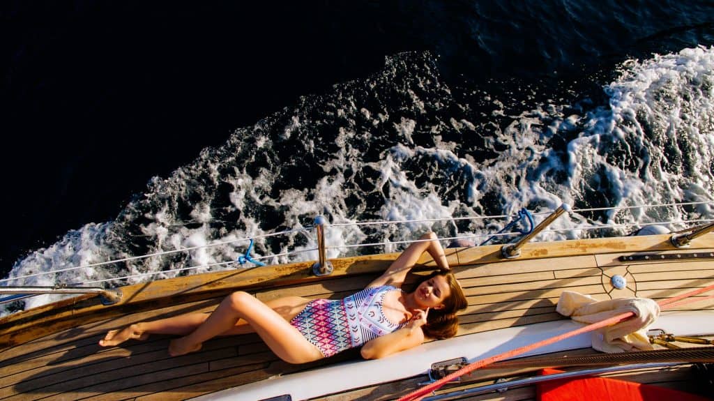 luxury woman yachting in sea top view